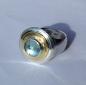 Preview: Ein wundervoller, zart hellblauer Edeltopas, eingebettet in ein goldenes Band, gefasst in Silber auf einer gegossenen Ringschiene ebenfalls aus 935er Silber.