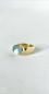 Preview: Ein zauberhafter Aquamarin, gefasst in 18kt Gelbgold auf einer Ringschiene aus ebenfalls 750 Gelbgold.