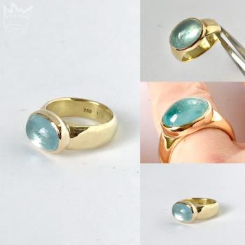 Preview: Ein zauberhafter Aquamarin, gefasst in 18kt Gelbgold auf einer Ringschiene aus ebenfalls 750 Gelbgold.