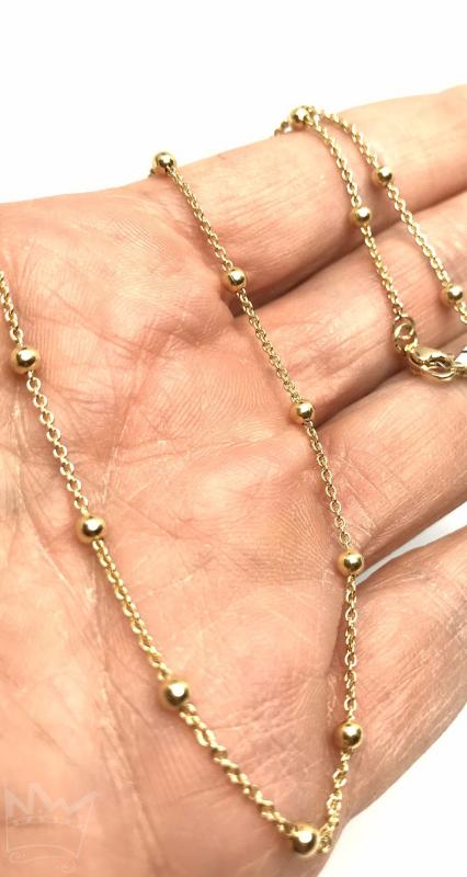 Goldene Ankerkette mit Kugeln